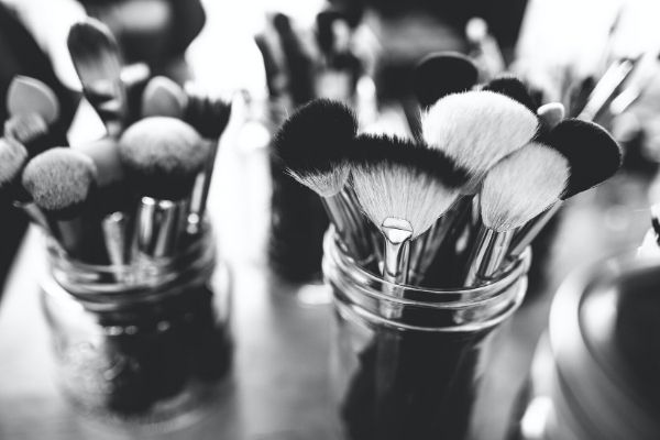 makeup brushes in containers